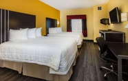 Bedroom 7 Days Inn & Suites Wyndham Augusta Near Fort Gordon