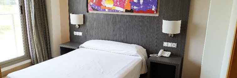 Kamar Tidur Alcocebre Suites Hotel 3000