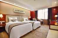 ห้องนอน Guangxi Wharton International Hotel