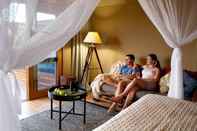 Bedroom Zoofari Lodge