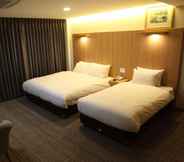 Phòng ngủ 6 Jinju Dongbang Tourist Hotel