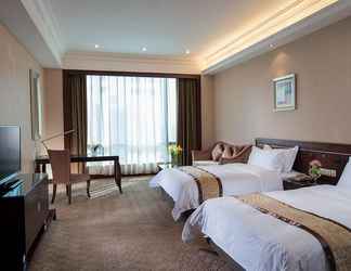 Bedroom 2 Vienna International Hotel Shenzhen Huanancheng B