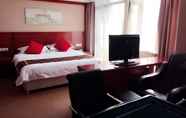 Kamar Tidur 7 Vienna Hotel (Pudong Airport SNIEC Branch)