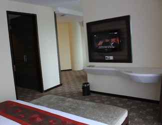 Bedroom 2 Metro Suite Hotel Jababeka