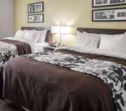 Bedroom 4 Sleep Inn & Suites
