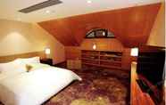 ห้องนอน 5 Qingdao Impression Hotel