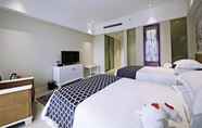 Bilik Tidur 2 Howard Johnson by  City of Flower Hotel Kunming