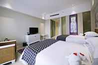 ห้องนอน Howard Johnson by  City of Flower Hotel Kunming