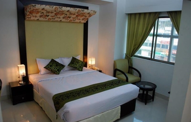 Kamar Tidur 2 Orchid Business Hotel