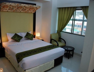 Kamar Tidur 2 Orchid Business Hotel