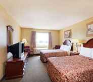 Bedroom 7 Days Inn & Suites by Wyndham Wynne