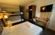 Bedroom 4 Kyriad Grenoble Nord - Le Fontanil