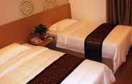 Bilik Tidur 4 Greentree Sunshine 100 Express Hotel