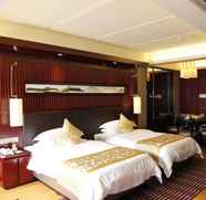 Kamar Tidur 4 Yihe Glory Hotel