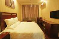Bedroom GreenTree Inn Municipal  Government Express Hotel
