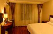Bedroom 6 GreenTree Inn Dazhong  International Auto City Bus