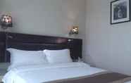 Bedroom 4 Guangzhou Oasis Hotel