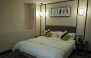 Kamar Tidur 7 Homies Hotel