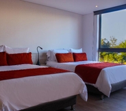 Bedroom 7 MG Hotels & Suites