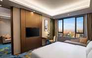 Bedroom 6 Ramada Encore by Wyndham Wuhan Caidian