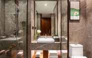 In-room Bathroom 2 Ramada Encore by Wyndham Wuhan Caidian