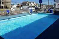 Swimming Pool Rodeway Inn Island Beach State Park