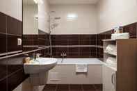 Phòng tắm bên trong Brasov Holiday Apartments - PERLA