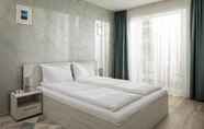 Bedroom 6 Brasov Holiday Apartments - AQUA