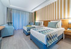 卧室 6 Lonicera Premium Hotel