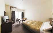 Kamar Tidur 7 First Hotel