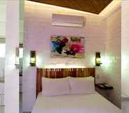 Bedroom 3 Serviced Apartments by Eco Hotel Bohol