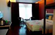 Kamar Tidur 6 Strawberry Garden Hotel