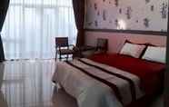 Kamar Tidur 5 Strawberry Garden Hotel