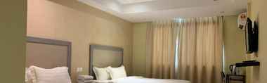 Bedroom 3 MCity Inn