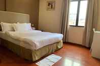 Kamar Tidur MCity Inn