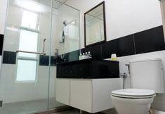 ห้องน้ำภายในห้อง 4 G Suites at Mansion One