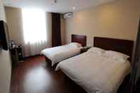 ห้องนอน Harbin Jiashun Business Hotel