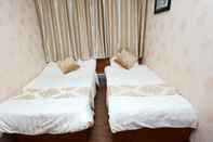 Kamar Tidur NEW STYLE HOTEL