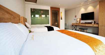 Kamar Tidur 4 A-One Hotel