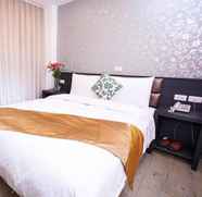 Kamar Tidur 4 Jin Bao Hotel