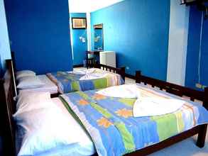 Kamar Tidur 4 Tamaraw Beach Resort