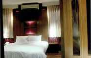 Bilik Tidur 4 Strand Inn Hotel