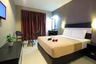 Kamar Tidur Oriental City Inn