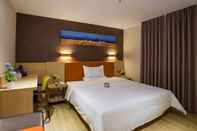 Kamar Tidur Iu Hotel Guangzhou Sports Center Lin He West Metro