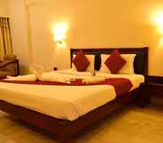 Bedroom 6 The Bhimas Residency Hotels Pvt Ltd