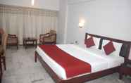 Bedroom 2 The Bhimas Residency Hotels Pvt Ltd