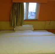 Kamar Tidur 5 7 DAYS INN GUANGZHOU HUANGPU TIMES CITY