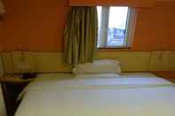 Kamar Tidur 7 DAYS INN GUANGZHOU HUANGPU TIMES CITY