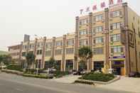 Luar Bangunan 7 Days Inn Haier Industry Zone Baolong Plaza