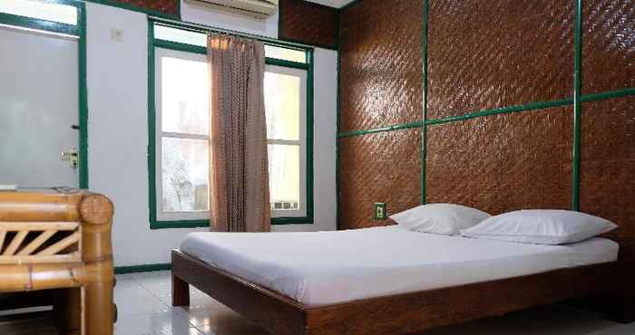 Bedroom NIRMALA RESORT